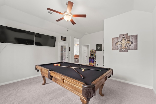 recreation room featuring carpet floors, ceiling fan, visible vents, and vaulted ceiling