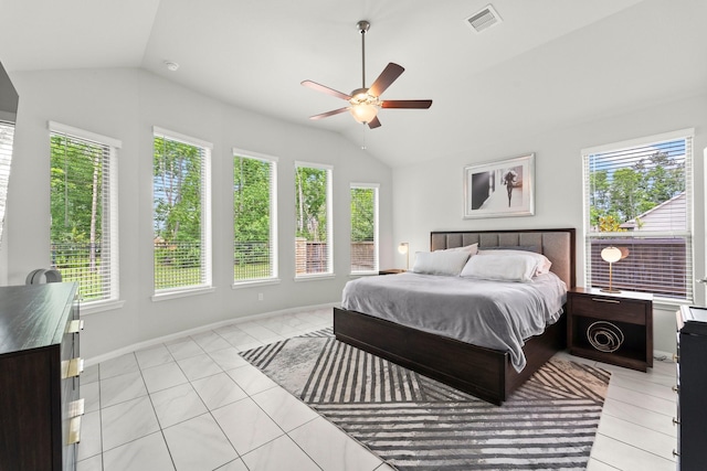 bedroom featuring light tile patterned floors, a ceiling fan, vaulted ceiling, and visible vents