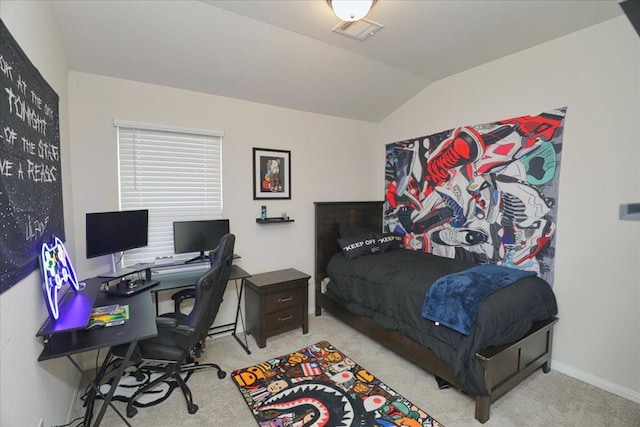 carpeted bedroom featuring lofted ceiling and visible vents