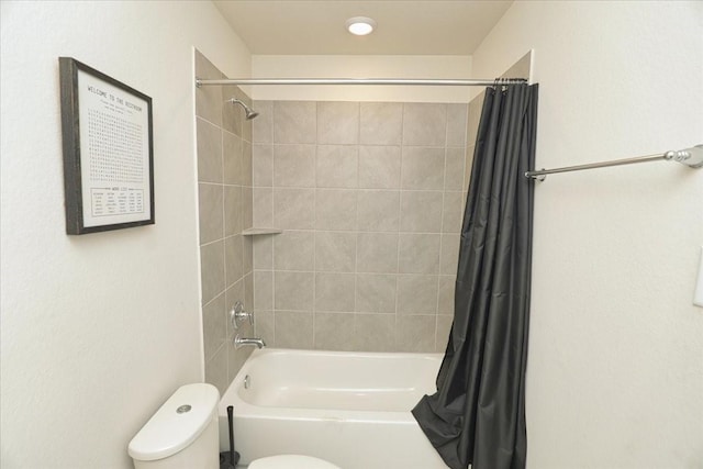 bathroom with toilet and shower / bathtub combination with curtain
