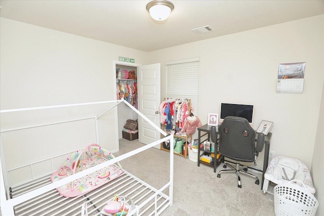 interior space with visible vents and carpet