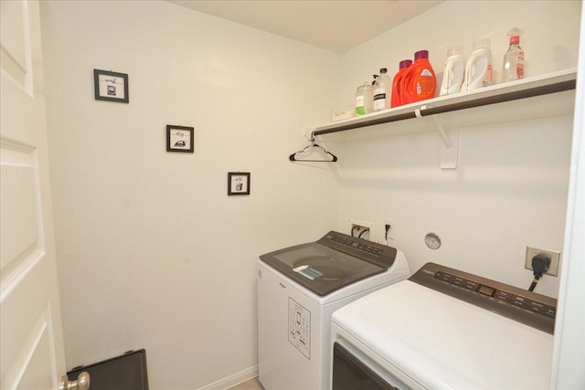 washroom with washer and dryer and laundry area