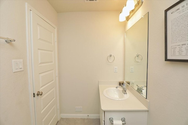 bathroom with vanity, tile patterned floors, and visible vents