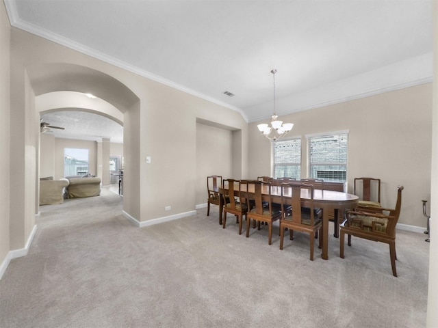 18223 E Willow Oak Bend Dr, Cypress, TX 77433 - dining room featuring crown molding, baseboards, and a healthy amount of sunlight