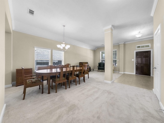 dining space featuring light carpet, ornamental molding, baseboards, and visible vents