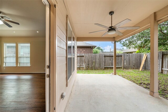 view of patio / terrace with a fenced backyard and ceiling fan