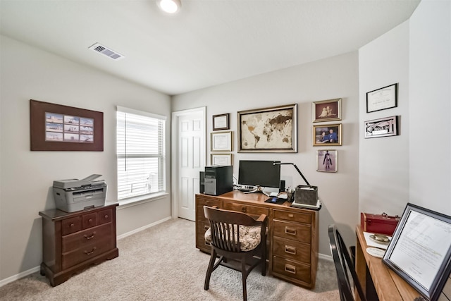 carpeted office featuring baseboards and visible vents