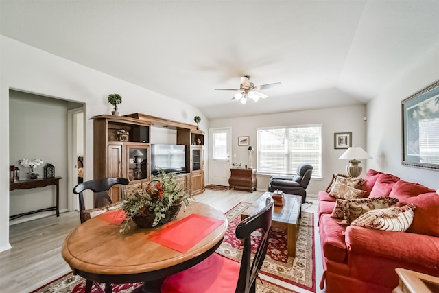living area featuring ceiling fan and light wood-style floors