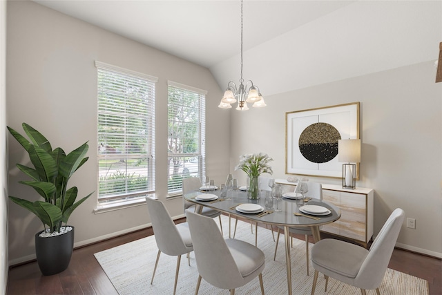 dining area with baseboards, dark wood-type flooring, a healthy amount of sunlight, and an inviting chandelier