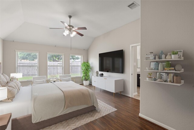 bedroom with visible vents, lofted ceiling, baseboards, ceiling fan, and dark wood-type flooring