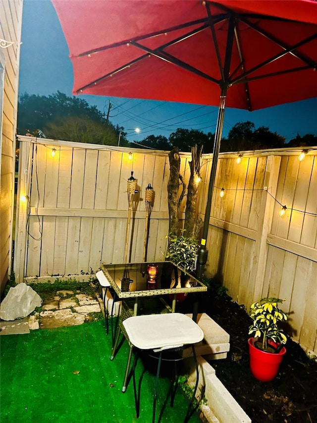 9502 Windswept Ln Unit 9502, Houston, TX 77063 - view of patio / terrace featuring a fenced backyard