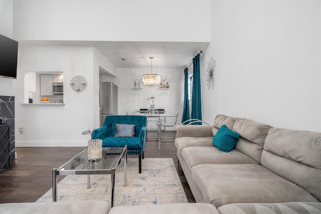 9502 Windswept Ln Unit 9502, Houston, TX 77063 - living room featuring baseboards and wood finished floors