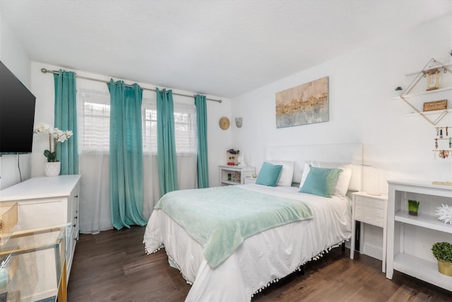 9502 Windswept Ln Unit 9502, Houston, TX 77063 - bedroom featuring dark wood finished floors