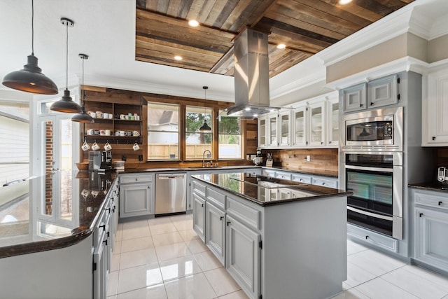 7711 Oxfordshire Dr, Spring, TX 77379 - kitchen featuring a sink, wood ceiling, light tile patterned floors, and stainless steel appliances