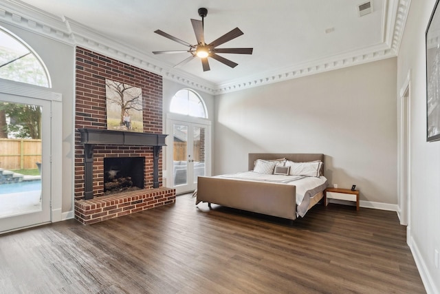 7711 Oxfordshire Dr, Spring, TX 77379 - bedroom featuring access to outside, ornamental molding, wood finished floors, and visible vents