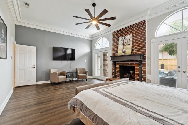 7711 Oxfordshire Dr, Spring, TX 77379 - bedroom featuring french doors, visible vents, wood finished floors, baseboards, and access to outside