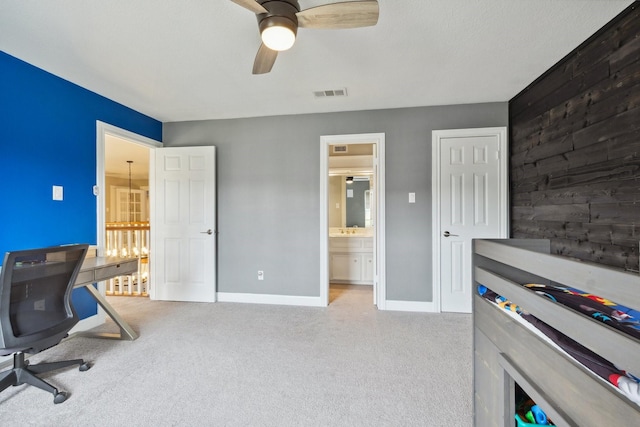 7711 Oxfordshire Dr, Spring, TX 77379 - office space featuring baseboards, carpet, a ceiling fan, and visible vents