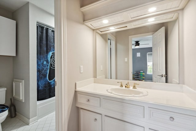 7711 Oxfordshire Dr, Spring, TX 77379 - bathroom featuring ceiling fan, vanity, toilet, shower / bath combo with shower curtain, and recessed lighting