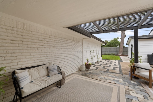 view of patio / terrace with a fenced backyard and a pergola