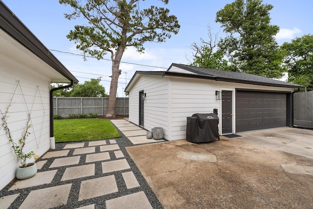 detached garage with fence