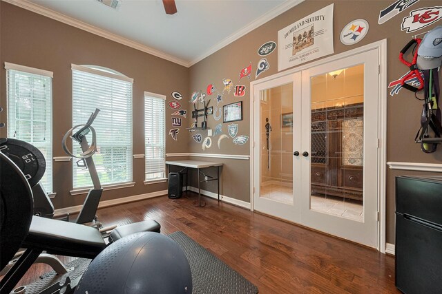 exercise room with a ceiling fan, french doors, wood finished floors, baseboards, and ornamental molding