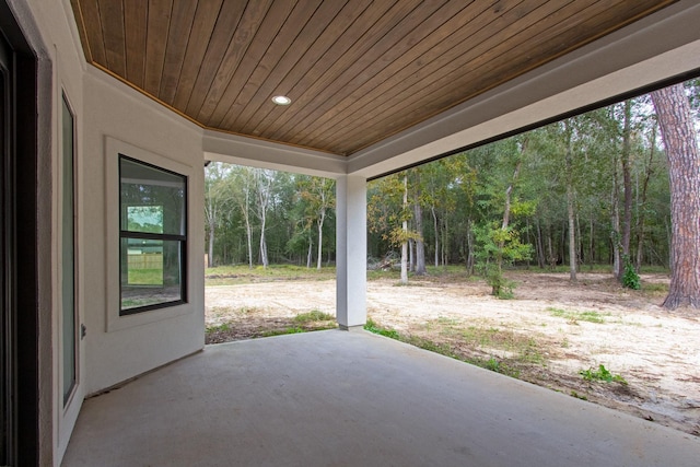 79 Rd 6606, Dayton, TX 77535 - view of patio with a forest view