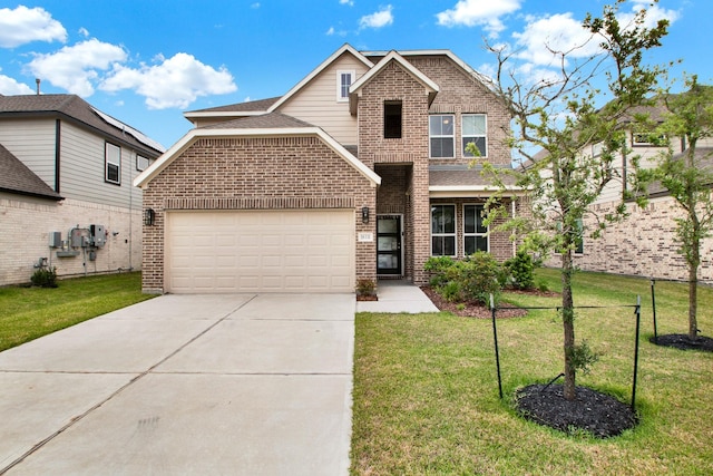 18331 Yaupon Bough Ln, Tomball, TX 77377 - view of front facade with an attached garage, concrete driveway, a front lawn, and brick siding