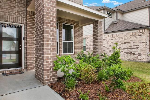 18331 Yaupon Bough Ln, Tomball, TX 77377 - doorway to property with a shingled roof and brick siding