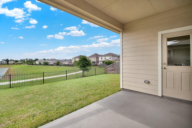 18331 Yaupon Bough Ln, Tomball, TX 77377 - view of yard featuring a residential view, a fenced backyard, and a patio area