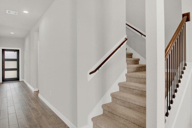 18331 Yaupon Bough Ln, Tomball, TX 77377 - staircase featuring recessed lighting, baseboards, visible vents, and wood finished floors