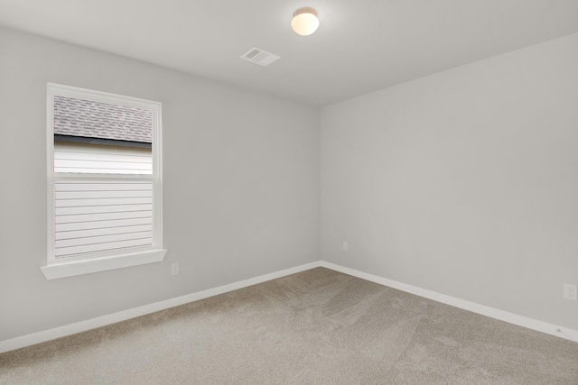 18331 Yaupon Bough Ln, Tomball, TX 77377 - spare room with carpet flooring, baseboards, and visible vents