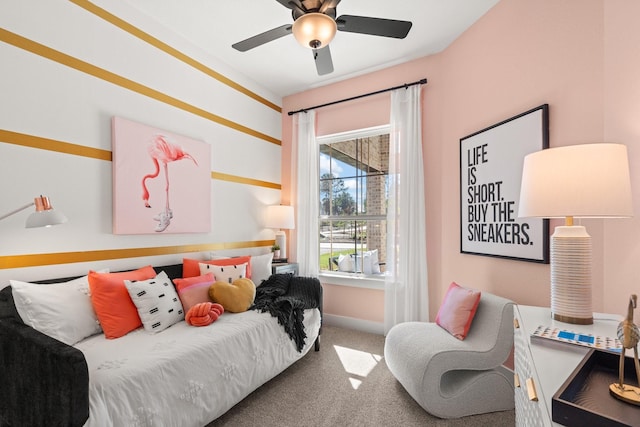 bedroom featuring carpet floors, baseboards, and ceiling fan