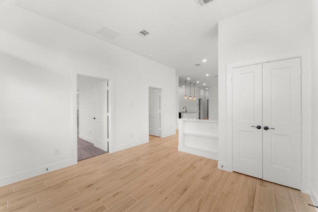 21517 Witham Promenade Ln, Magnolia, TX 77355 - spare room featuring light wood finished floors, recessed lighting, and baseboards