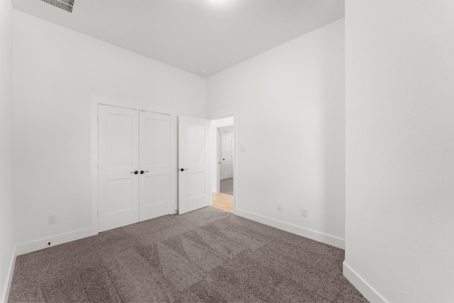 21517 Witham Promenade Ln, Magnolia, TX 77355 - unfurnished bedroom featuring carpet flooring, baseboards, and a closet