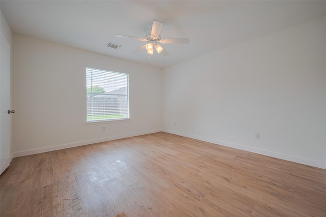 10918 Linden Gate Dr, Houston, TX 77075 - empty room featuring light wood-style flooring, ceiling fan, and baseboards