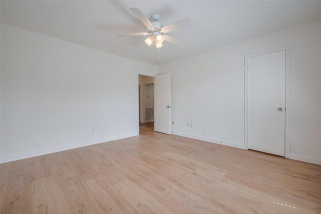 10918 Linden Gate Dr, Houston, TX 77075 - unfurnished room featuring light wood-style flooring, a ceiling fan, and baseboards