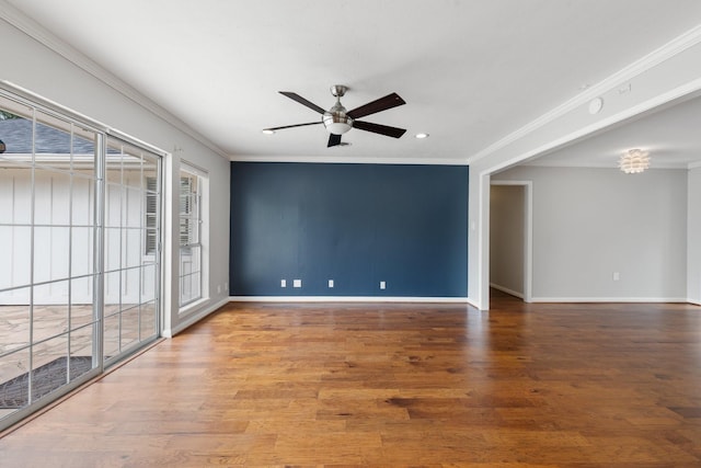 unfurnished room featuring ceiling fan, wood finished floors, baseboards, ornamental molding, and recessed lighting