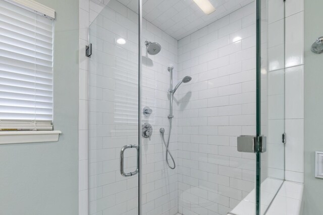bathroom with a stall shower