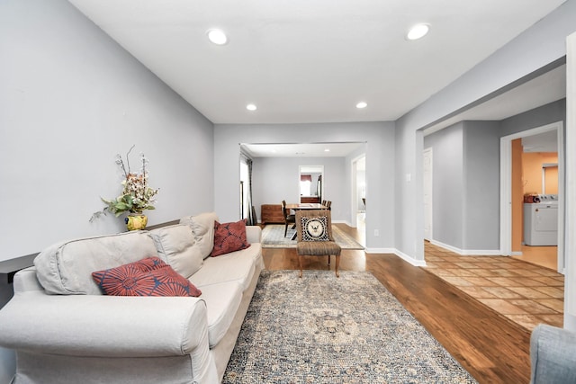6102 Ghana Ln, Pasadena, TX 77505 - living room featuring washer / dryer, recessed lighting, wood finished floors, and baseboards