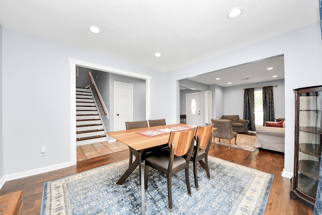 6102 Ghana Ln, Pasadena, TX 77505 - dining space featuring stairway, wood finished floors, baseboards, and recessed lighting