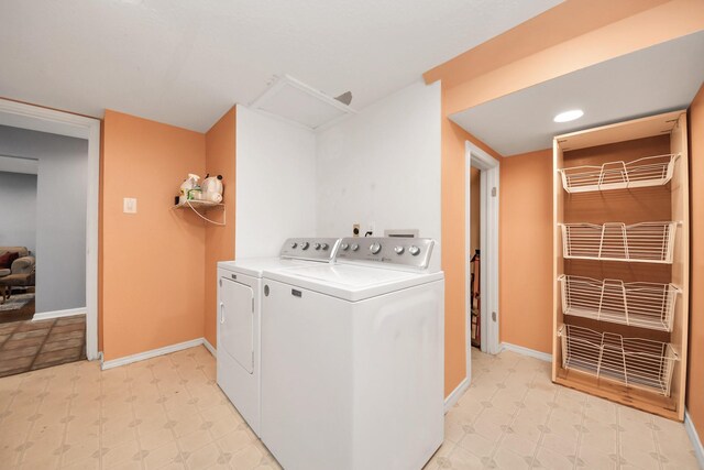 6102 Ghana Ln, Pasadena, TX 77505 - washroom with separate washer and dryer, baseboards, light floors, and recessed lighting