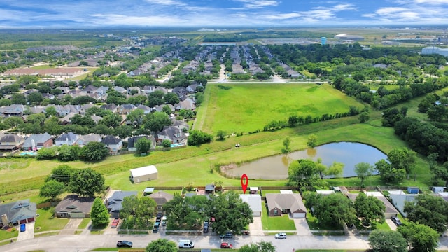 6102 Ghana Ln, Pasadena, TX 77505 - aerial perspective of suburban area with a large body of water