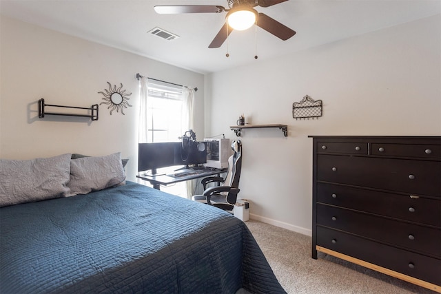 bedroom featuring baseboards, a ceiling fan, light colored carpet, and visible vents