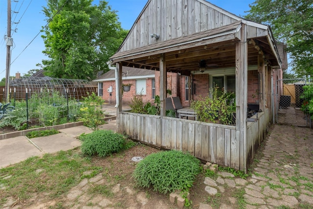 view of patio / terrace featuring fence private yard and a vegetable garden