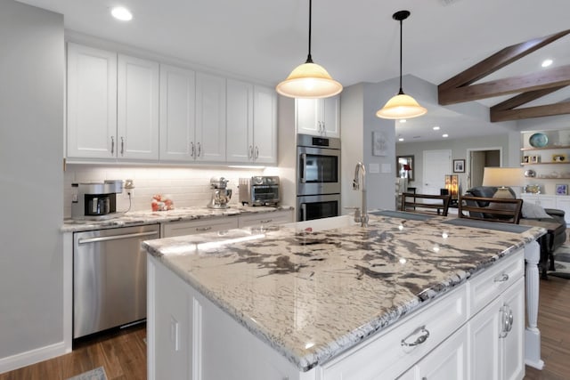kitchen featuring recessed lighting, tasteful backsplash, stainless steel appliances, and dark wood finished floors