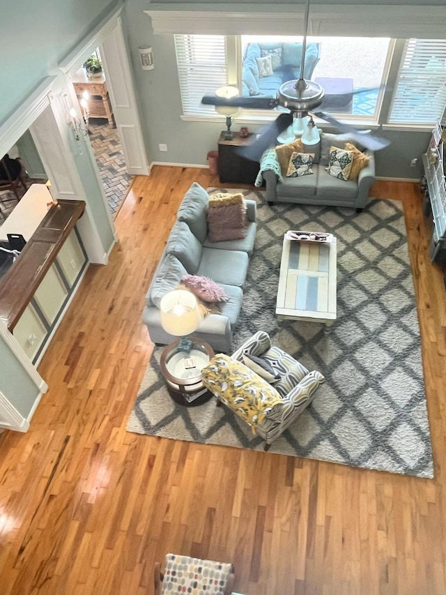 18606 Spring Heather Ct, Spring, TX 77379 - living area featuring wood finished floors and baseboards