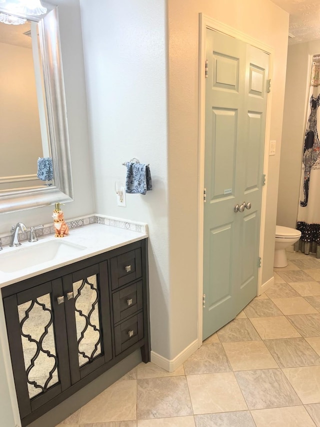 18606 Spring Heather Ct, Spring, TX 77379 - full bath with vanity, toilet, and baseboards