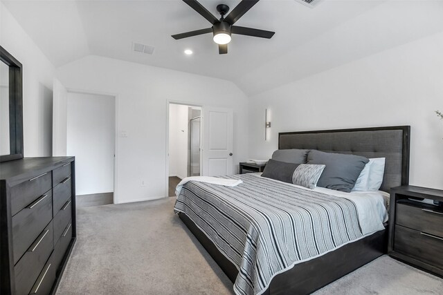 carpeted bedroom featuring visible vents, ceiling fan, and lofted ceiling