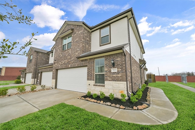 view of front facade featuring brick siding, a garage, fence, and concrete driveway