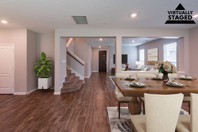 4219 Mossy Banks Ln, Houston, TX 77068 - dining area featuring wood finished floors, stairs, recessed lighting, and baseboards